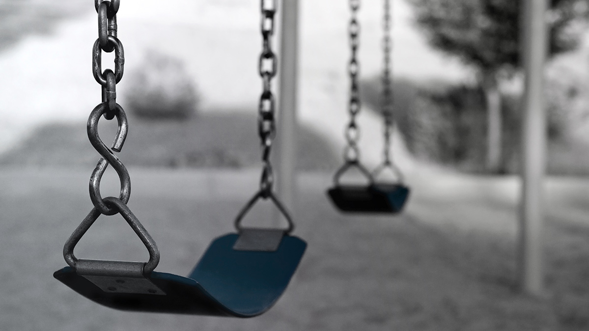 Empty playground swings